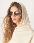 Gafas de sol doradas ovaladas de metal con patillas marrón efecto carey de ASOS DESIGN, 1 de 3